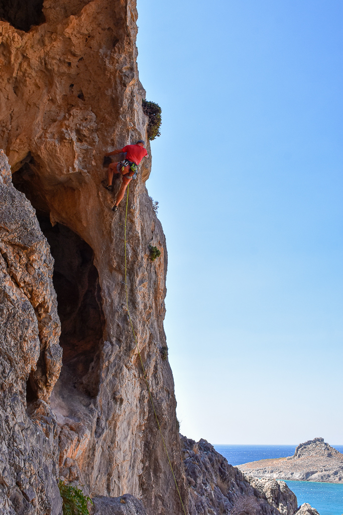 Person rock climbing in Amatou gorge, Xerokampos, east Crete