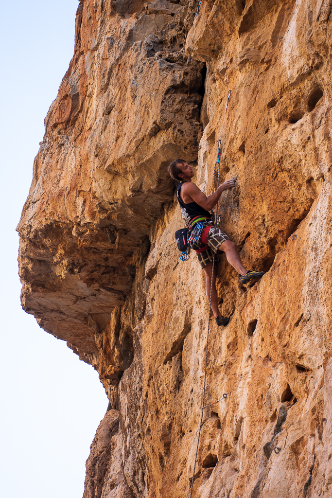 Person rock climbing in Lamnoni (Gorge of Xerokampos), east Crete