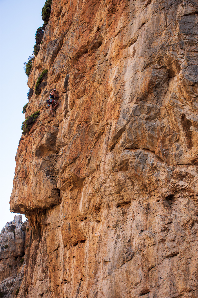 Person rock climbing in Lamnoni (Gorge of Xerokampos), east Crete